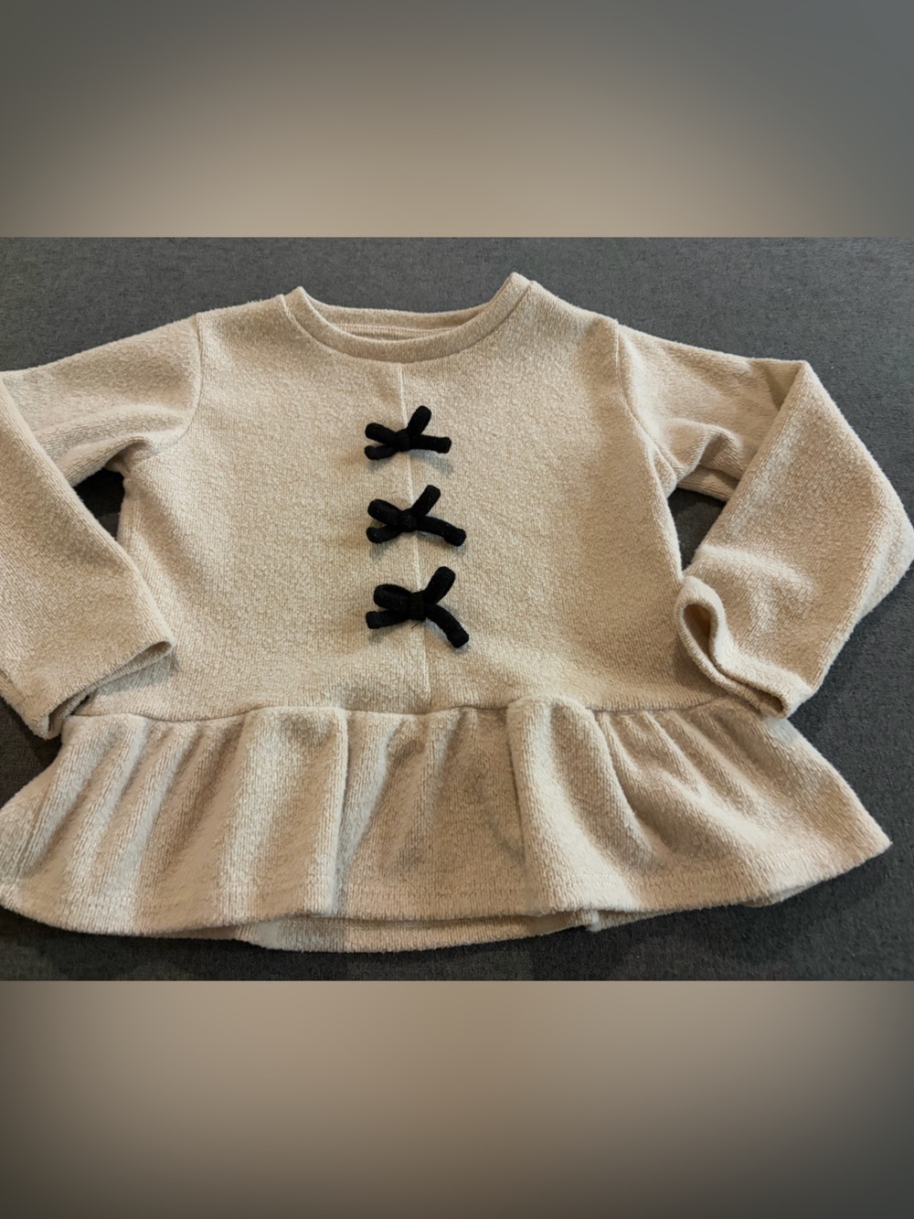 Zara Cream Peplum Top with Black Bow Accents